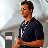 Adrian speaking at a conference